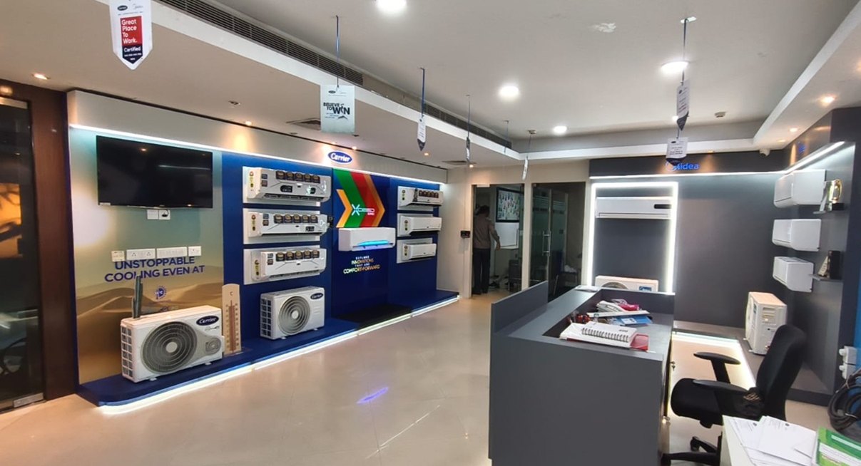 Brand experience showroom with a reception counter and product displays